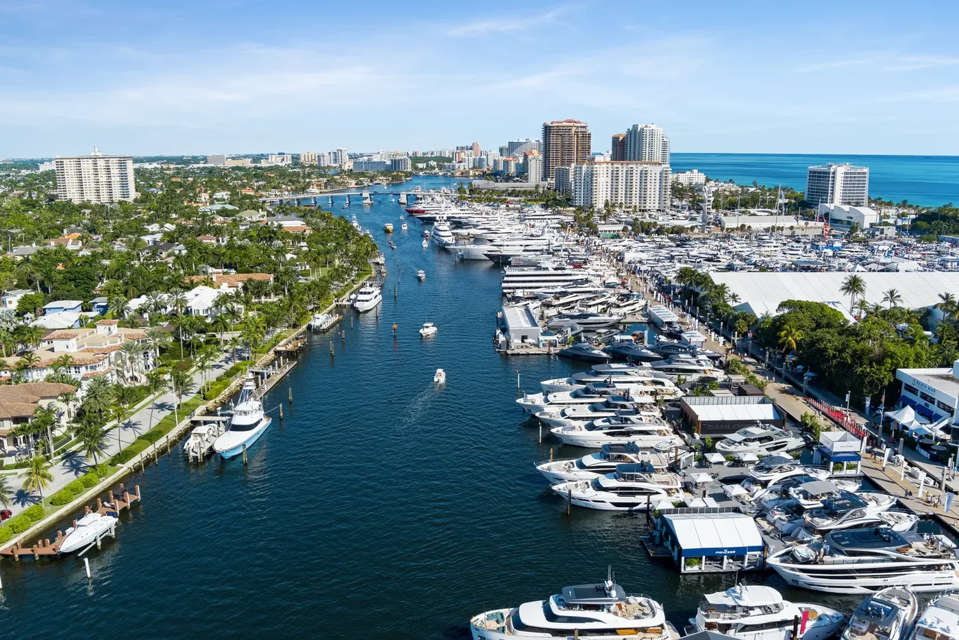 A marina packed end to end with yachts during a boat show